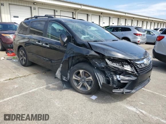 ✅ 2018 Honda Odyssey Touring • VIN: 5FNRL6H89JB043637 • Lot: 71041115. Wystawiony na Copart z przebiegiem 177 861 mil. Bezpłatny archiwum sprzedaży aukcyjnych z USA i szczegółowy raport historii pojazdu na DreamBid. Zdjęcie 4.