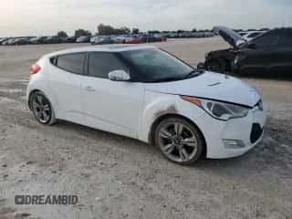 2012 Hyundai Veloster w/Red Int с VIN KMHTC6AD4CU076435, выставлен на аукционе Copart как лот 73015964 с пробегом 136 324 миль миль и Списание • Salvage title. История ставок и продаж доступна на DreamBid. Изображение 4.