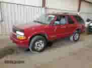 2003 Chevrolet Blazer LS z VIN 1GNCT18X13K165163, wystawiony jako Copart lot #78693034 z przebiegiem 159 770 mil mil oraz Szkoda całkowita • Salvage title. Historia ofert i sprzedaży dostępna na DreamBid. Obrazek 1.