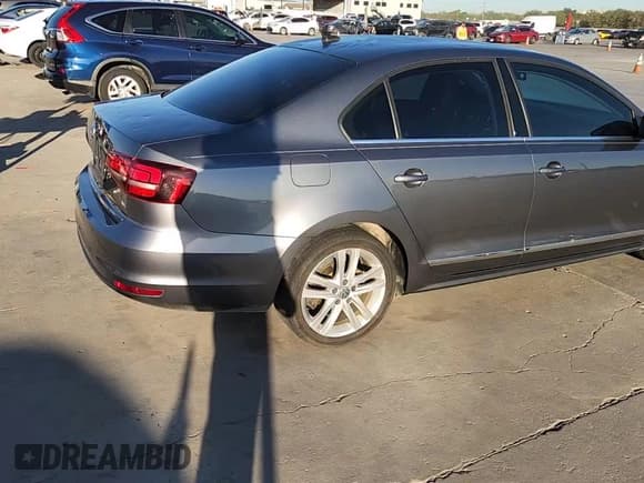 ✅ 2017 Volkswagen Jetta SEL • VIN: 3VWL17AJ8HM338178 • Lot: 87084975. Listed on Copart with Not provided. Free auction sales archive from the USA and detailed vehicle history report at DreamBid. Image 13.