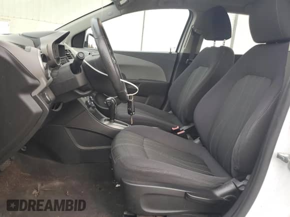 2013 Chevrolet Sonic LT with VIN 1G1JC6SG0D4230167, listed as a Copart auction lot 90614715 with 143,604 mi miles and Clean title. Bid and sale history available at DreamBid. Image 7.