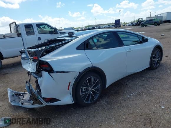 ✅ 2024 Toyota Prius LE • VIN: JTDACAAU2R3030356 • Lot: 43279750. Listed on IAAI with 8,721 mi. Free auction sales archive from the USA and detailed vehicle history report at DreamBid. Image 4.