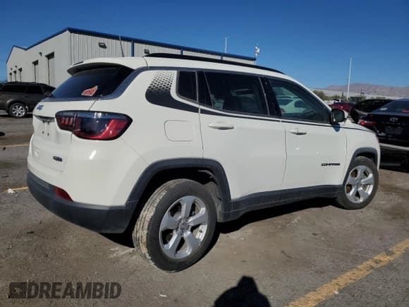 ✅ 2021 Jeep Compass Altitude • VIN: 3C4NJCBB6MT585680 • Lot: 82595325. Listed on Copart with 59,985 mi. Free auction sales archive from the USA and detailed vehicle history report at DreamBid. Image 3.