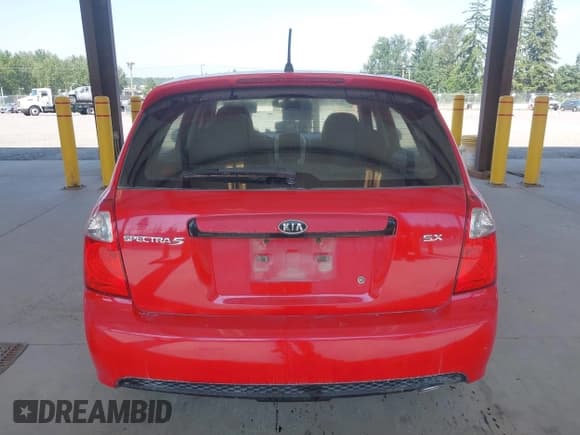 ✅ 2009 Kia Spectra Spectra5 • VIN: KNAFE241595023877 • Lot: 42583449. Listed on IAAI with 160,843 mi. Free auction sales archive from the USA and detailed vehicle history report at DreamBid. Image 17.