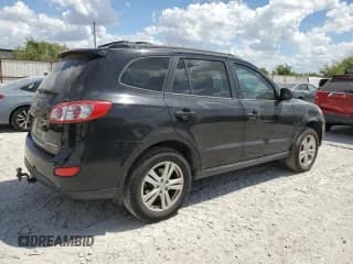✅ 2011 Hyundai Santa Fe SE • VIN: 5XYZHDAG9BG022031 • Lot: 69696804. Listed on Copart with 294,653 mi. Free auction sales archive from the USA and detailed vehicle history report at DreamBid. Image 3.