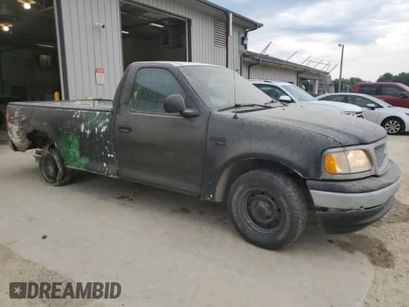 ✅ 1999 Ford F-150 • VIN: 1FTRF17W1XKA13215 • Lot: 67721245. Wystawiony na Copart z przebiegiem Nie podano. Bezpłatny archiwum sprzedaży aukcyjnych z USA i szczegółowy raport historii pojazdu na DreamBid. Zdjęcie 4.