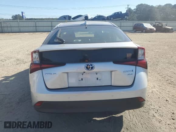 2021 Toyota Prius L Eco with VIN JTDKAMFU7M3137514, listed as a Copart auction lot 85843795 with 31,718 mi miles and Salvage title. Bid and sale history available at DreamBid. Image 6.