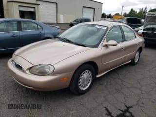 ✅ 1996 Mercury Sable LS • VIN: 1MELM53S8TA610706 • Лот: 71457605. Опубликован ранее на Copart с пробегом 64 513 миль. Бесплатный доступ к архиву аукционных продаж из США и подробный отчёт об истории автомобиля на DreamBid. Изображение 1.