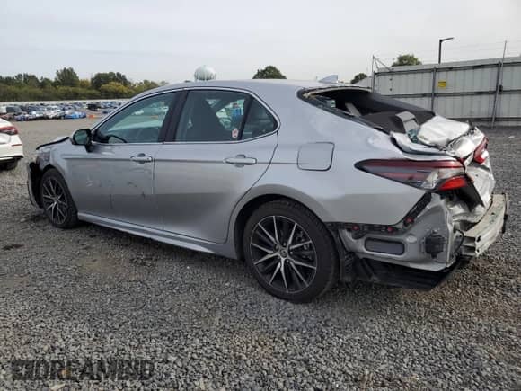 2022 Toyota Camry SE с VIN 4T1T11BK6NU060794, выставлен на аукционе Copart как лот 84729115 с пробегом 39 327 миль миль и Списание • Salvage title. История ставок и продаж доступна на DreamBid. Изображение 2.