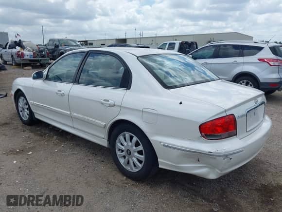 2004 Hyundai Sonata GLS z VIN KMHWF35H14A996574, wystawiony jako IAAI lot #42458020 z przebiegiem 167 012 mil mil oraz . Historia ofert i sprzedaży dostępna na DreamBid. Obrazek 3.