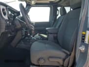 ✅ 2024 Jeep Wrangler Sahara • VIN: 1C4RJXP62RW228115 • Lot: 69132165. Listed on Copart with 6,032 mi. Free auction sales archive from the USA and detailed vehicle history report at DreamBid. Image 7.