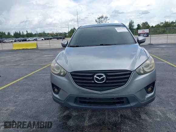 ✅ 2015 Mazda CX-5 Grand Touring • VIN: JM3KE2DY7F0506754 • Lot: 42941376. Wystawiony na IAAI z przebiegiem 143 762 mil. Bezpłatny archiwum sprzedaży aukcyjnych z USA i szczegółowy raport historii pojazdu na DreamBid. Zdjęcie 12.