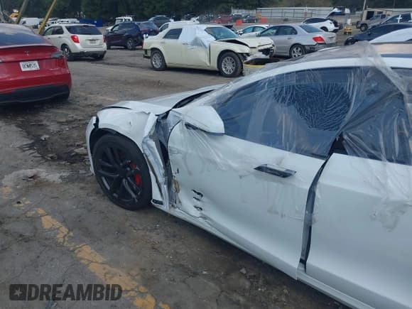 ✅ 2023 Tesla Model S Plaid • VIN: 5YJSA1E63PF521945 • Lot: 43248046. Listed on IAAI with 26,327 mi. Free auction sales archive from the USA and detailed vehicle history report at DreamBid. Image 18.