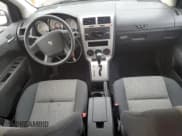 ✅ 2009 Dodge Caliber SXT • VIN: 1B3HB48AX9D259703 • Лот: 80551064. Опубликован ранее на Copart с пробегом 128 818 миль. Бесплатный доступ к архиву аукционных продаж из США и подробный отчёт об истории автомобиля на DreamBid. Изображение 8.