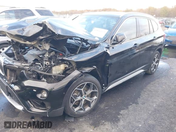 ✅ 2018 BMW X1 xDrive28i • VIN: WBXHT3C32J5L30876 • Lot: 43601112. Listed on IAAI with 27,972 mi. Free auction sales archive from the USA and detailed vehicle history report at DreamBid. Image 18.