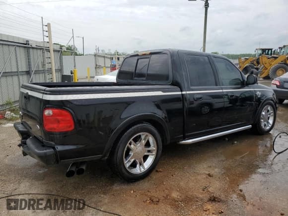 ✅ 2003 Ford F-150 Harley-Davidson • VIN: 1FTRW07333KD41438 • Lot: 54342755. Listed on Copart with 216,391 mi. Free auction sales archive from the USA and detailed vehicle history report at DreamBid. Image 3.