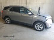 ✅ 2018 Chevrolet Equinox Premier • VIN: 3GNAXVEV3JS627987 • Lot: 70763055. Listed on Copart with 65,879 mi. Free auction sales archive from the USA and detailed vehicle history report at DreamBid. Image 4.