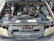 ✅ 1998 Isuzu Hombre • VIN: 1GGCS19X0W8650520 • Lot: 73962444. Wystawiony na Copart z przebiegiem Nie podano. Bezpłatny archiwum sprzedaży aukcyjnych z USA i szczegółowy raport historii pojazdu na DreamBid. Zdjęcie 11.