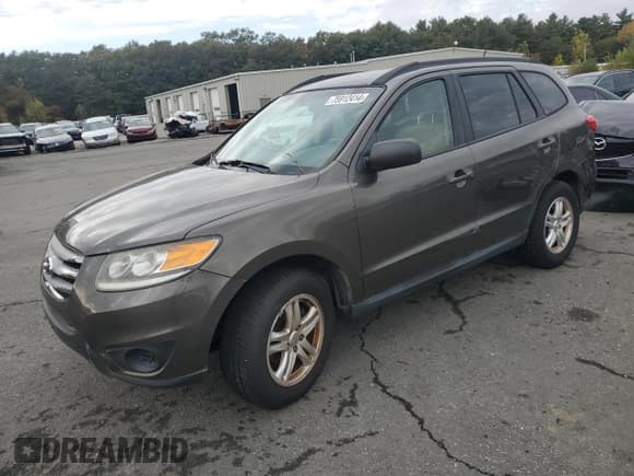 ✅ 2012 Hyundai Santa Fe GLS • VIN: 5XYZGDAB8CG155100 • Lot: 75912414. Listed on Copart with 139,580 mi. Free auction sales archive from the USA and detailed vehicle history report at DreamBid. Image 1.
