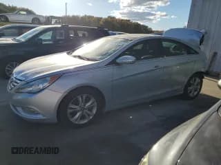✅ 2012 Hyundai Sonata SE • VIN: 5NPEC4ACXCH419882 • Lot: 75942604. Listed on Copart with 131,632 mi. Free auction sales archive from the USA and detailed vehicle history report at DreamBid. Image 1.