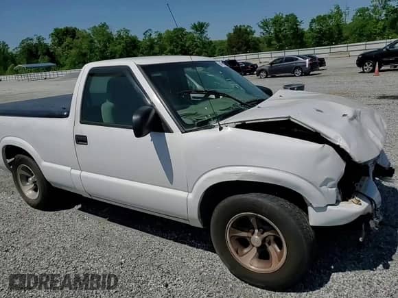 2002 Chevrolet S-10 LS с VIN 1GCCS145328251781, выставлен на аукционе Copart как лот 54455095 с пробегом 214 107 миль миль и Списание • Salvage title. История ставок и продаж доступна на DreamBid. Изображение 13.