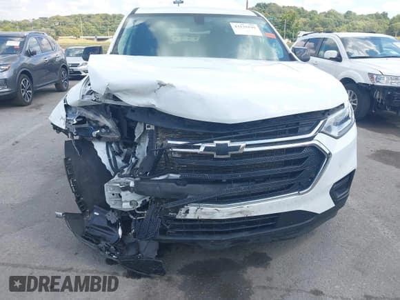 ✅ 2021 Chevrolet Traverse LS • VIN: 1GNERFKW9MJ171336 • Lot: 43135599. Listed on IAAI with 63,765 mi. Free auction sales archive from the USA and detailed vehicle history report at DreamBid. Image 6.