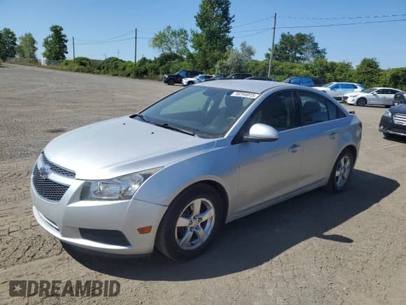2014 Chevrolet Cruze 1LT with VIN 1G1PC5SB5E7218492, listed as a Copart auction lot 70284915 with 170,608 mi miles and Salvage title. Bid and sale history available at DreamBid. Image 1.