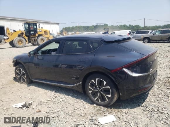 ✅ 2022 Kia EV6 Wind • VIN: KNDC3DLC7N5044248 • Лот: 63352534. Опубликован ранее на Copart с пробегом 16 797 миль. Бесплатный доступ к архиву аукционных продаж из США и подробный отчёт об истории автомобиля на DreamBid. Изображение 2.