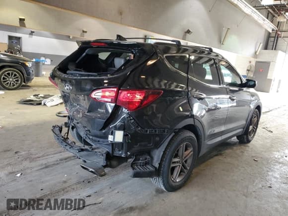 ✅ 2017 Hyundai Santa Fe 2.4L • VIN: 5NMZUDLB2HH012260 • Лот: 41802653. Опубликован ранее на Copart с пробегом 64 811 миль. Бесплатный доступ к архиву аукционных продаж из США и подробный отчёт об истории автомобиля на DreamBid. Изображение 3.