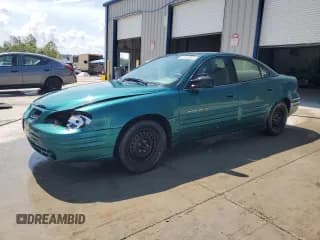 ✅ 1999 Pontiac Grand Am SE2 • VIN: 1G2NE52T9XM721260 • Lot: 67848985. Listed on Copart with 181,747 mi. Free auction sales archive from the USA and detailed vehicle history report at DreamBid. Image 1.