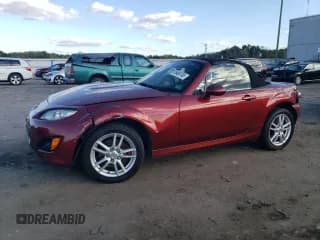 ✅ 2010 Mazda MX-5 Miata Sport • VIN: JM1NC2EF2A0208985 • Lot: 85486795. Listed on Copart with 131,820 mi. Free auction sales archive from the USA and detailed vehicle history report at DreamBid. Image 1.