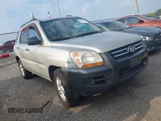 ✅ 2006 Kia Sportage LX • VIN: KNDJE723367278932 • Лот: 42899843. Опубликован ранее на IAAI с пробегом 163 245 миль. Бесплатный доступ к архиву аукционных продаж из США и подробный отчёт об истории автомобиля на DreamBid. Изображение 1.