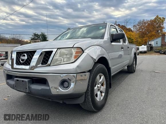 ✅ 2009 Nissan Frontier SE • VIN: 1N6AD09W89C411798 • Lot: 77967144. Listed on Copart with 210,803 mi. Free auction sales archive from the USA and detailed vehicle history report at DreamBid. Image 1.