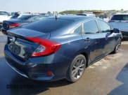 ✅ 2020 Honda Civic EX-L • VIN: 19XFC1F71LE019521 • Lot: 43215277. Listed on IAAI with 56,892 mi. Free auction sales archive from the USA and detailed vehicle history report at DreamBid. Image 4.