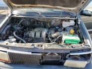 ✅ 1993 Chrysler Town & Country • VIN: 1C4GH54R3PX777061 • Lot: 49072805. Wystawiony na Copart z przebiegiem 194 190 mil. Bezpłatny archiwum sprzedaży aukcyjnych z USA i szczegółowy raport historii pojazdu na DreamBid. Zdjęcie 13.