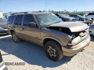 2002 Chevrolet Blazer LS z VIN 1GNDT13W32K236266, wystawiony jako Copart lot #77162424 z przebiegiem 194 532 mil mil oraz Szkoda całkowita • Salvage title. Historia ofert i sprzedaży dostępna na DreamBid. Obrazek 4.