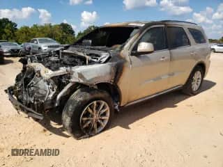 2015 Dodge Durango SXT z VIN 1C4RDHAG1FC139373, wystawiony jako Copart lot #81510205 z przebiegiem Nie podano mil oraz Szkoda całkowita • Salvage title. Historia ofert i sprzedaży dostępna na DreamBid. Obrazek 1.