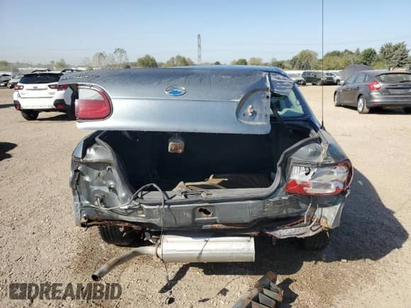 2003 Chevrolet Malibu with VIN 1G1ND52J83M648169, listed as a Copart auction lot 74711844 with 156,544 mi miles and Salvage title. Bid and sale history available at DreamBid. Image 6.