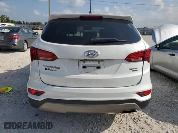 ✅ 2018 Hyundai Santa Fe 2.4L • VIN: 5NMZTDLB2JH061323 • Лот: 65529083. Опубликован ранее на Copart с пробегом 47 391 миль. Бесплатный доступ к архиву аукционных продаж из США и подробный отчёт об истории автомобиля на DreamBid. Изображение 6.