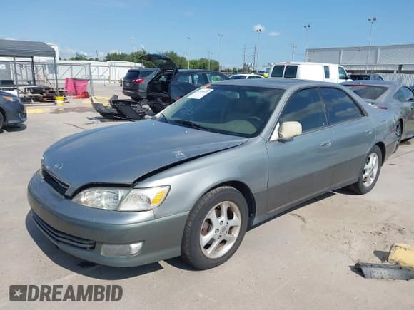 ✅ 2000 Lexus ES 300 • VIN: JT8BF28G8Y0262430 • Lot: 42939524. Listed on IAAI with 166,765 mi. Free auction sales archive from the USA and detailed vehicle history report at DreamBid. Image 2.