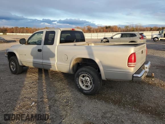 ✅ 1999 Dodge Dakota SLT • VIN: 1B7GG22Y3XS275370 • Lot: 81568994. Wystawiony na Copart z przebiegiem 241 945 mil. Bezpłatny archiwum sprzedaży aukcyjnych z USA i szczegółowy raport historii pojazdu na DreamBid. Zdjęcie 2.