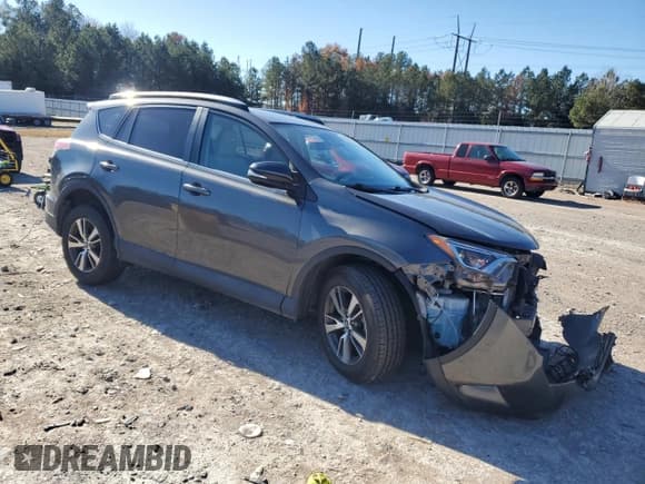 ✅ 2018 Toyota RAV4 XLE • VIN: 2T3RFREV1JW843703 • Lot: 92076105. Listed on Copart with 68,826 mi. Free auction sales archive from the USA and detailed vehicle history report at DreamBid. Image 4.