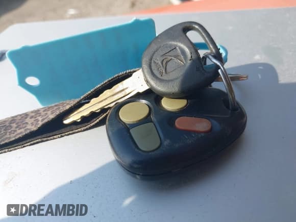 ✅ 1997 Saturn 2dr Coupe • VIN: 1G8ZH127XVZ333643 • Лот: 42463504. Опубликован ранее на IAAI с пробегом 104 295 миль. Бесплатный доступ к архиву аукционных продаж из США и подробный отчёт об истории автомобиля на DreamBid. Изображение 11.