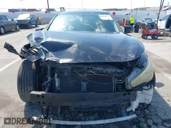 ✅ 2014 Infiniti Q50 • VIN: JN1BV7AP0EM678572 • Lot: 42828079. Listed on IAAI with 171,854 mi. Free auction sales archive from the USA and detailed vehicle history report at DreamBid. Image 12.