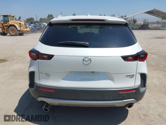 ✅ 2023 Mazda CX-50 Premium • VIN: 7MMVABDY5PN107511 • Lot: 41323099. Listed on IAAI with 52,059 mi. Free auction sales archive from the USA and detailed vehicle history report at DreamBid. Image 16.