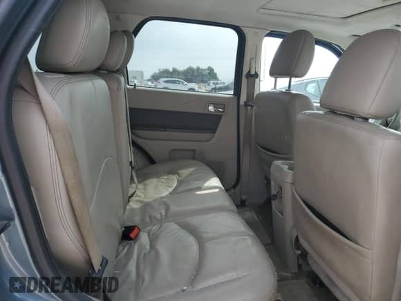 2010 Mercury Mariner Premier с VIN 4M2CN8H72AKJ26603, выставлен на аукционе Copart как лот 86836944 с пробегом Не указан миль и Списание • Salvage title. История ставок и продаж доступна на DreamBid. Изображение 11.