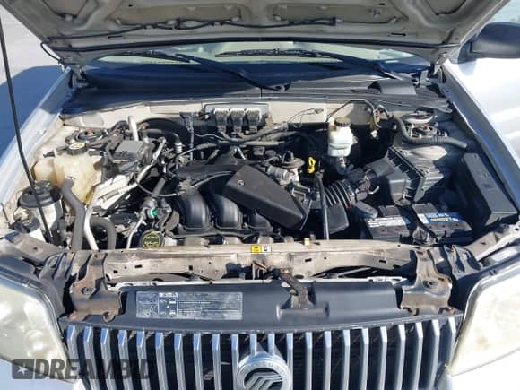 2006 Mercury Mariner Luxury z VIN 4M2YU56196DJ05801, wystawiony jako IAAI lot #42528336 z przebiegiem 162 851 mil mil oraz . Historia ofert i sprzedaży dostępna na DreamBid. Obrazek 10.