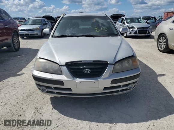 2006 Hyundai Elantra GLS z VIN KMHDN56D36U193588, wystawiony jako Copart lot #76793044 z przebiegiem Nie podano mil oraz Szkoda całkowita • Salvage title. Historia ofert i sprzedaży dostępna na DreamBid. Obrazek 5.