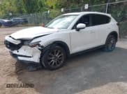 ✅ 2020 Mazda CX-5 Grand Touring • VIN: JM3KFBDM1L1767197 • Lot: 43378286. Listed on IAAI with 71,078 mi. Free auction sales archive from the USA and detailed vehicle history report at DreamBid. Image 17.