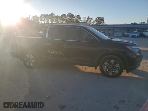 ✅ 2019 Honda Ridgeline RTL-T • VIN: 5FPYK2F69KB004192 • Lot: 90980145. Listed on Copart with 68,198 mi. Free auction sales archive from the USA and detailed vehicle history report at DreamBid. Image 4.